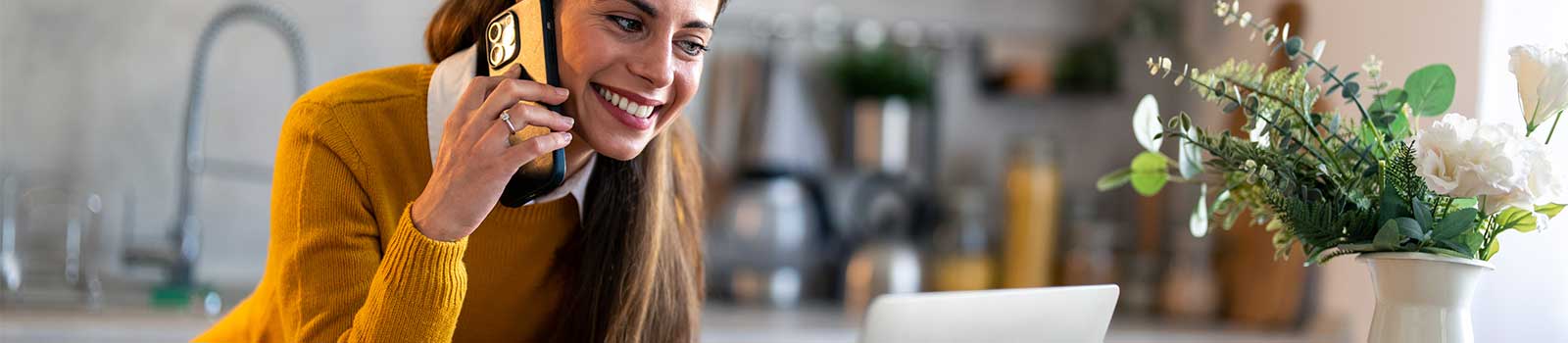 Professional HVAC expert from Pierce Refrigeration is on the phone with a customer, listening to their HVAC needs in order to make the best decisions on their heating and cooling system
